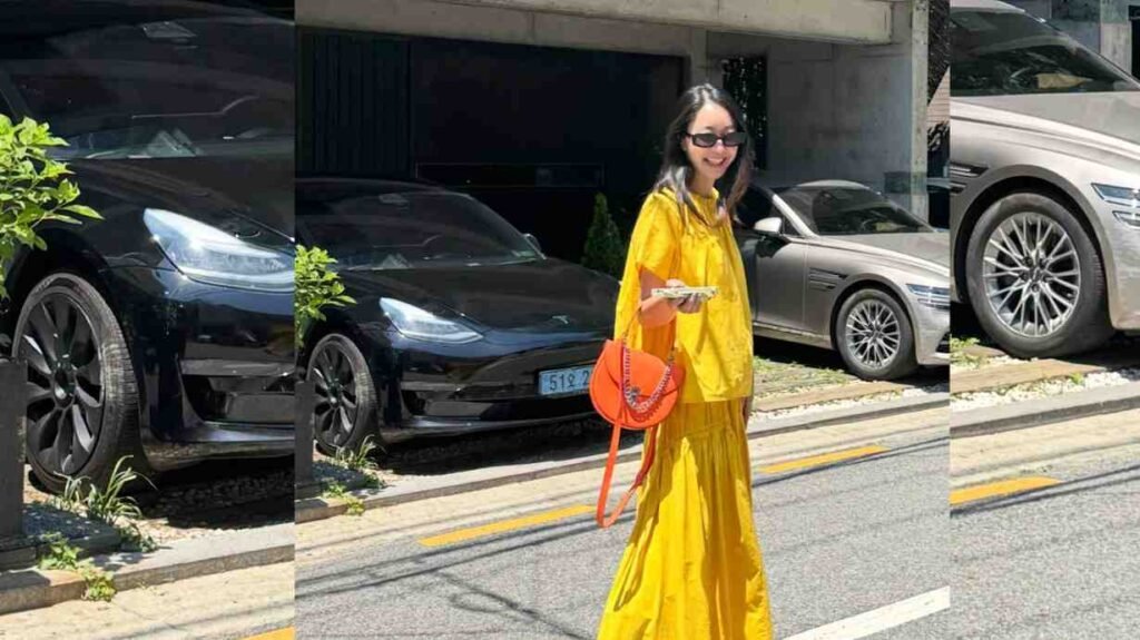 Seo Hyo-rim (서효림) in bright yellow dress and sunglasses walks, carrying an orange round bag, with parked cars behind.
